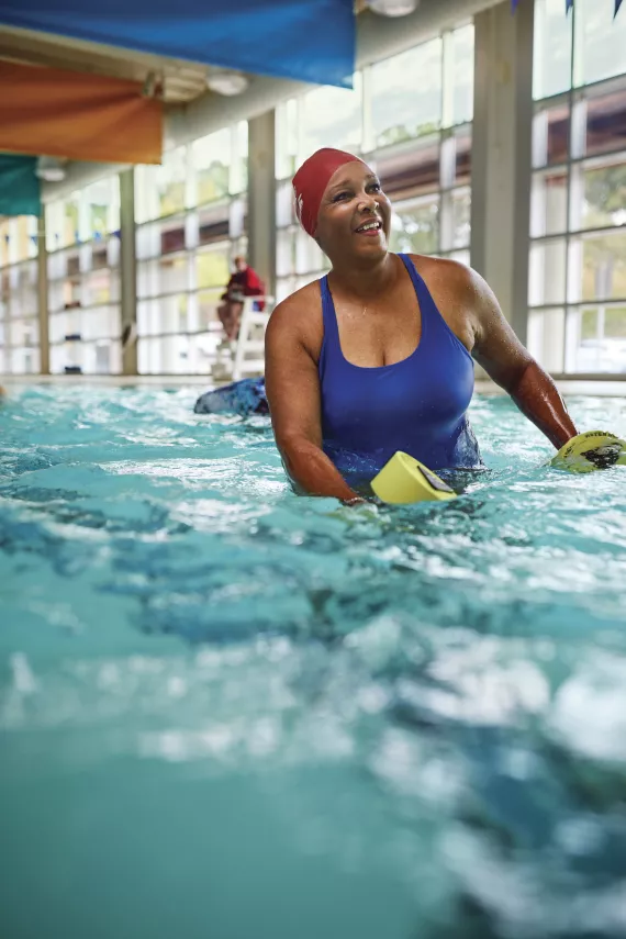 Active Older Adult Doing Water Exercises